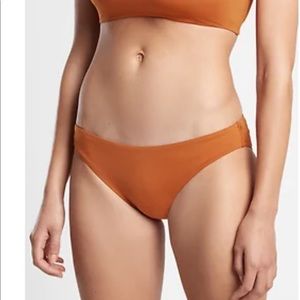 Athleta clean medium bottom rust small NWT